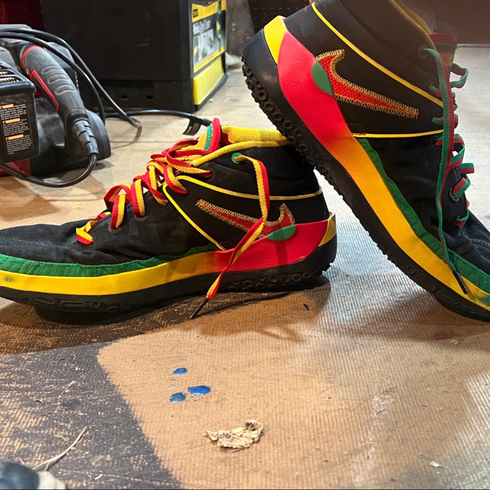 Hummel Men's Black Sneakers with Yellow and Green Accents